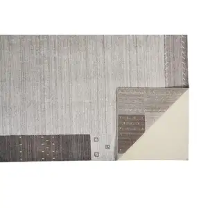 Photo of Gray Silver And Black Wool Hand Knotted Stain Resistant Area Rug