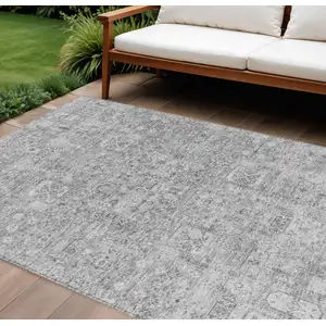 Photo of Gray Silver And Charcoal Floral Washable Indoor Outdoor Area Rug