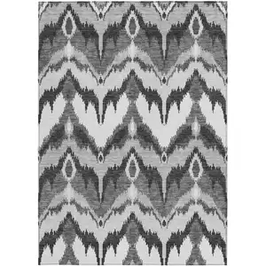 Photo of Gray Silver And Charcoal Ikat Washable Indoor Outdoor Area Rug