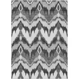 Photo of Gray Silver And Charcoal Ikat Washable Indoor Outdoor Area Rug