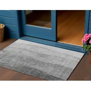 Photo of Gray Silver And Charcoal Ombre Washable Indoor Outdoor Area Rug