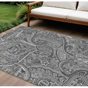 Photo of Gray Silver And Charcoal Paisley Washable Indoor Outdoor Area Rug