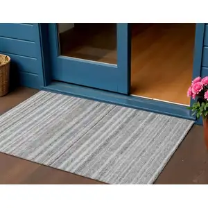 Photo of Gray Silver And Charcoal Striped Washable Indoor Outdoor Area Rug