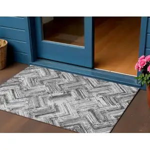 Photo of Gray Silver And Ivory Geometric Washable Indoor Outdoor Area Rug