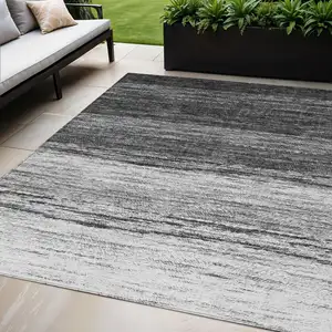 Photo of Gray Silver And Ivory Ombre Washable Indoor Outdoor Area Rug