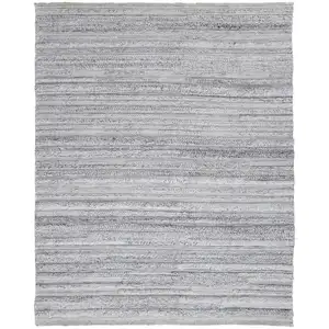 Photo of Gray Silver And Ivory Striped Hand Woven Stain Resistant Area Rug