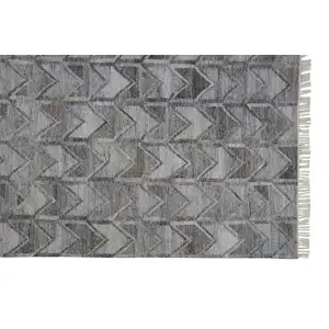 Photo of Gray Silver And Taupe Geometric Hand Woven Stain Resistant Area Rug With Fringe