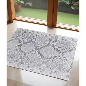 Photo of Gray Silver and Blue Floral Power Loom Area Rug