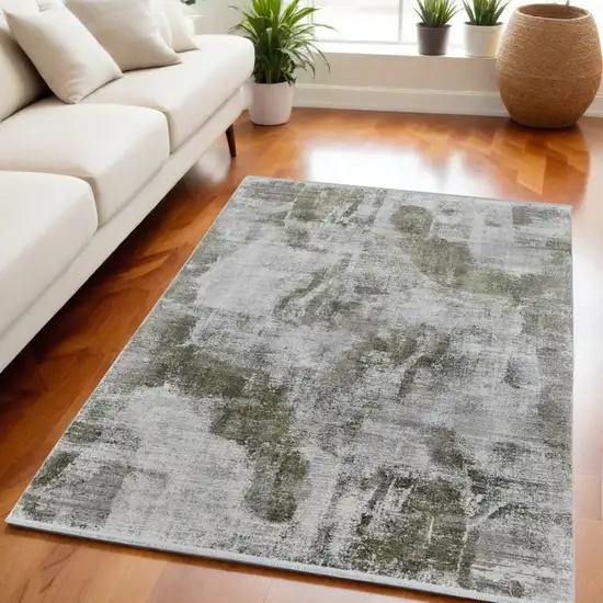 Gray Silver and Green Ikat Power Loom Area Rug With Fringe Photo 1