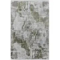 Photo of Gray Silver and Green Ikat Power Loom Area Rug With Fringe