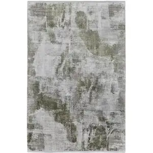 Photo of Gray Silver and Green Ikat Power Loom Area Rug With Fringe