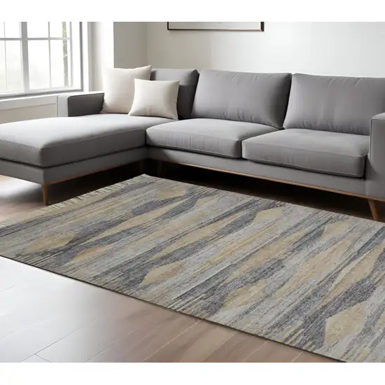 Gray and Ivory Abstract Hand Woven Area Rug With Fringe Photo 1