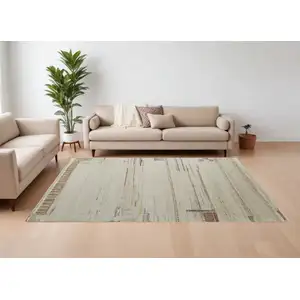 Photo of Gray Tan and Green Wool Abstract Hand Knotted Area Rug