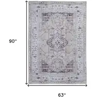 Photo of Gray Tan and Ivory Oriental Power Loom Worn Faded Washable Area Rug