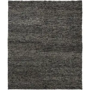 Photo of Gray Taupe And Black Wool Hand Woven Distressed Stain Resistant Area Rug