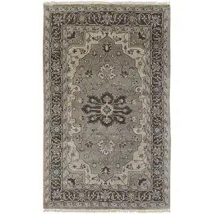 Photo of Gray Taupe And Blue Wool Floral Hand Knotted Stain Resistant Area Rug