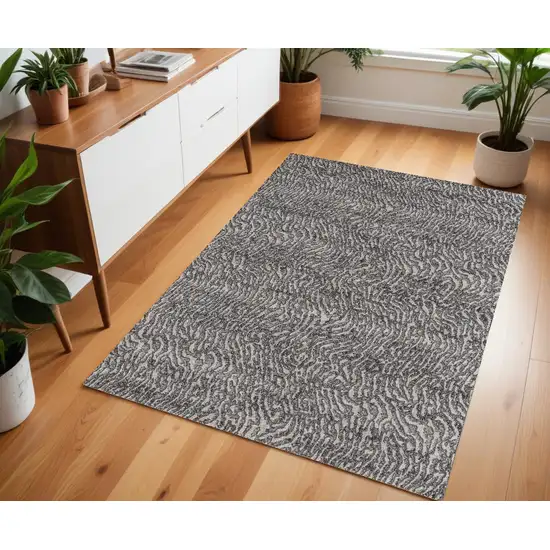 Gray and Ivory Abstract Power Loom Area Rug Photo 1