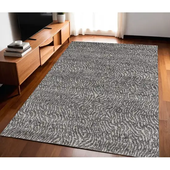 Gray and Ivory Abstract Power Loom Area Rug Photo 1