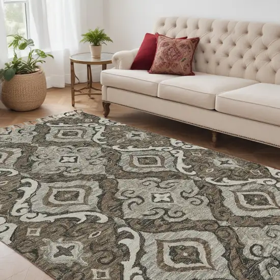 Gray Taupe And Ivory Wool Floral Tufted Handmade Area Rug With Fringe Photo 1