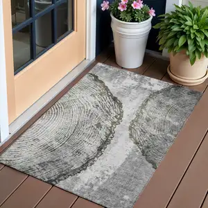 Photo of Gray Taupe And Silver Abstract Washable Indoor Outdoor Area Rug