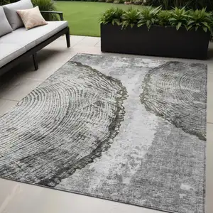 Photo of Gray Taupe And Silver Abstract Washable Indoor Outdoor Area Rug