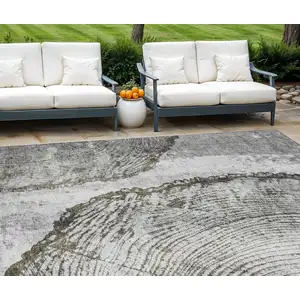 Photo of Gray Taupe And Silver Abstract Washable Indoor Outdoor Area Rug