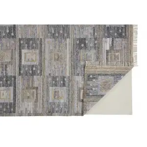 Photo of Gray Taupe And Tan Geometric Hand Woven Stain Resistant Area Rug With Fringe