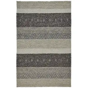 Photo of Gray Taupe And Tan Wool Floral Hand Woven Stain Resistant Area Rug