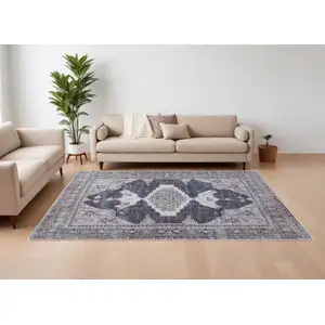 Photo of Gray Taupe and Ivory Oriental Power Loom Washable Area Rug