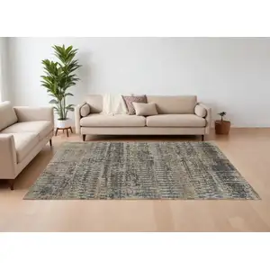 Photo of Gray Taupe and Ivory Wool Abstract Hand Knotted Area Rug