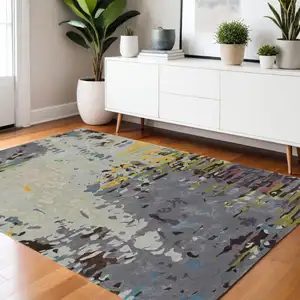 Photo of Gray Yellow And Black Abstract Hand Tufted Area Rug