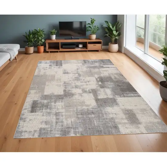 Gray and Beige Abstract Distressed Area Rug Photo 1