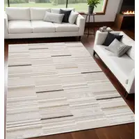 Photo of Gray and Beige Abstract Distressed Area Rug