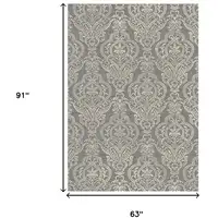 Photo of Gray and Beige Damask Area Rug