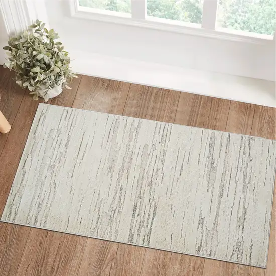 Gray and Beige Geometric Distressed Area Rug Photo 4