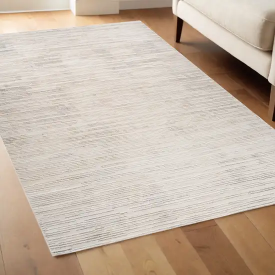 Gray and Beige Geometric Distressed Area Rug Photo 2