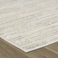 Photo of Gray and Beige Geometric Distressed Area Rug