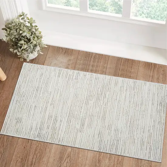 Gray and Beige Geometric Distressed Area Rug Photo 4