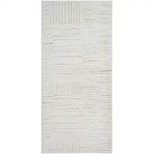 Photo of Gray and Beige Geometric Distressed Area Rug