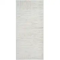 Photo of Gray and Beige Geometric Distressed Area Rug