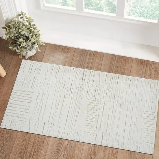 Gray and Beige Geometric Distressed Area Rug Photo 5