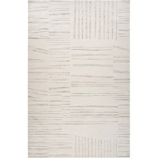 Gray and Beige Geometric Distressed Area Rug Photo 1