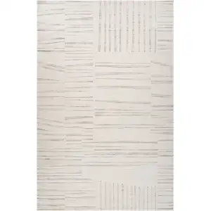 Photo of Gray and Beige Geometric Distressed Area Rug