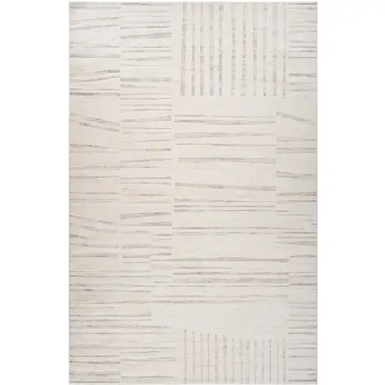 Gray and Beige Geometric Distressed Area Rug Photo 1