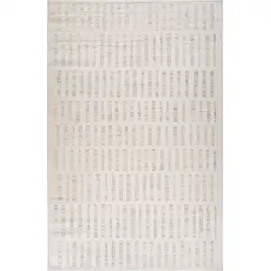 Photo of Gray and Beige Geometric Distressed Area Rug