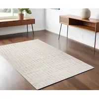 Photo of Gray and Beige Geometric Distressed Area Rug