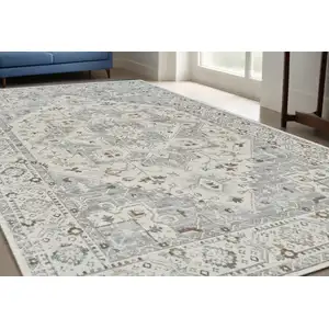 Photo of Gray and Beige Oriental Distressed Area Rug