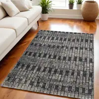 Photo of Gray and Black Geometric Power Loom Worn Faded Area Rug