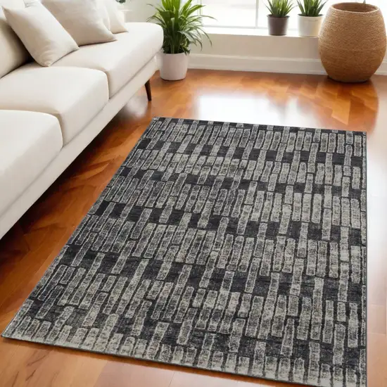 Gray and Black Geometric Power Loom Worn Faded Area Rug Photo 1