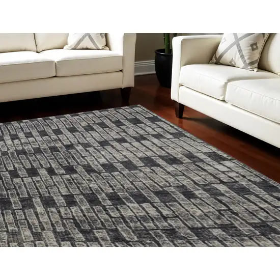 Gray and Black Geometric Power Loom Worn Faded Area Rug Photo 1